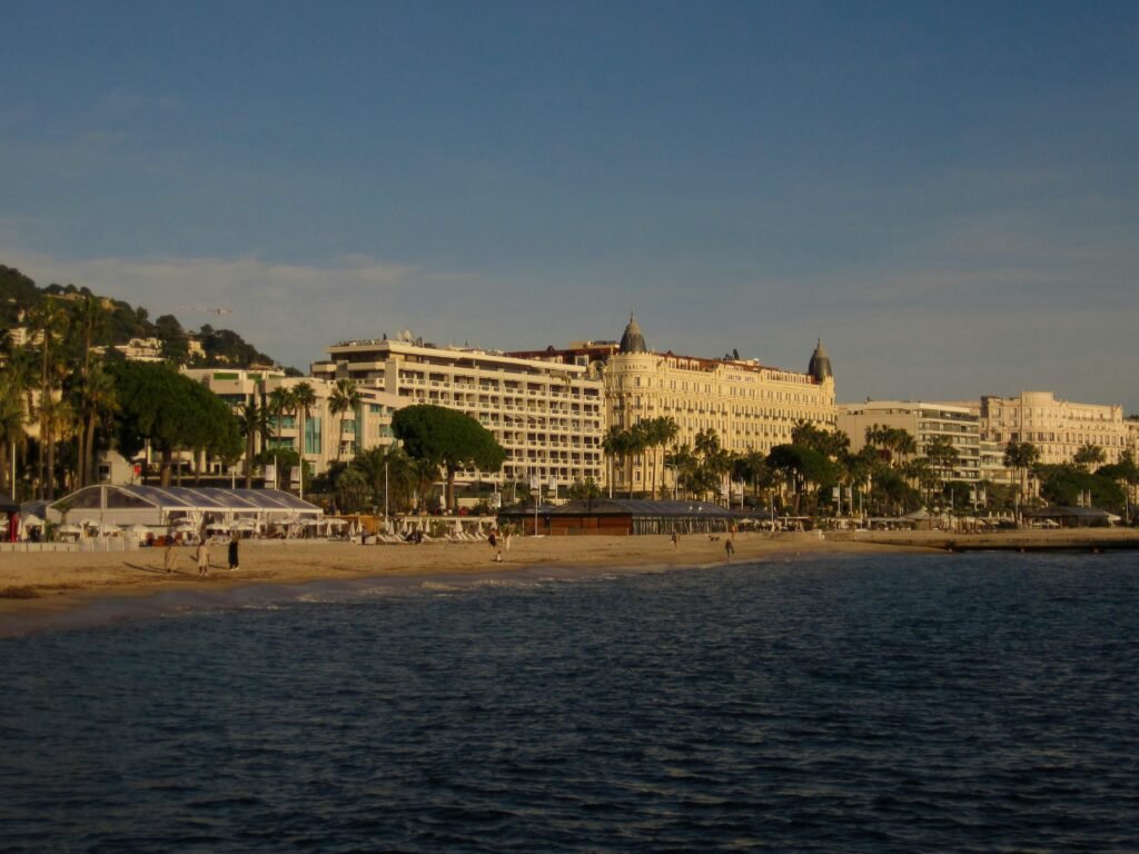 Explore the stunning beachfront architecture of Cannes, France at sunset.