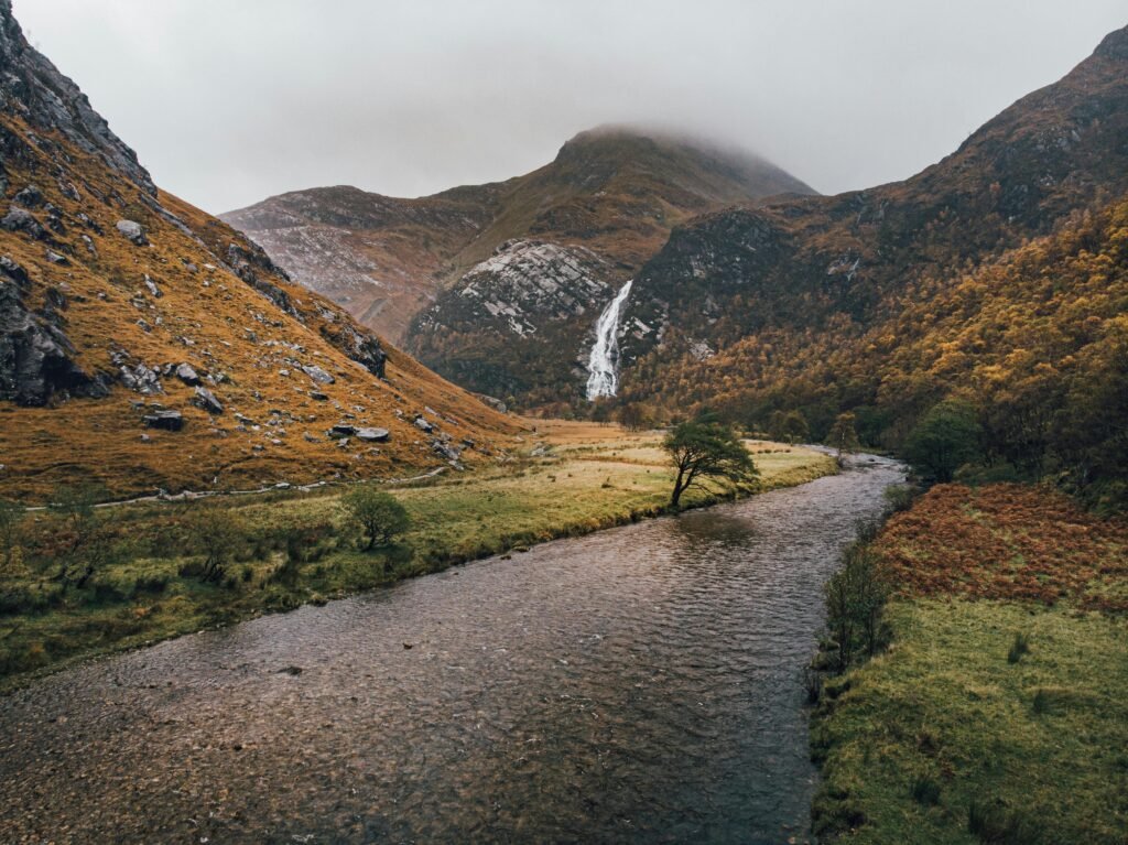Beautiful scenic view of a river and waterfall in autumn at Fort William, Scotland.
