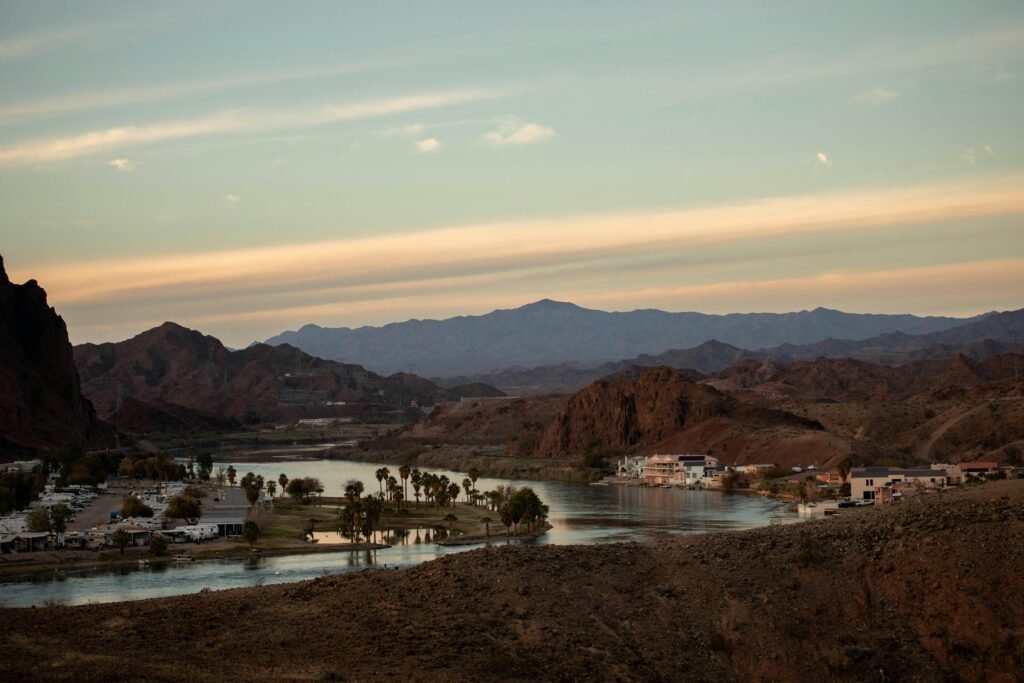 Stunning view of the Parker Arizona river surrounded by mountains and sunset skies.